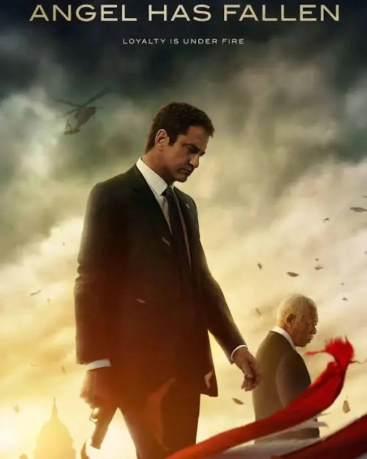 Angel Has Fallen film poster showing a suited man holding a child by the hand